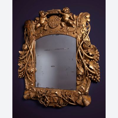A Louis Quartorze mirror with coat of arms of VOC governor Cornelis Kien