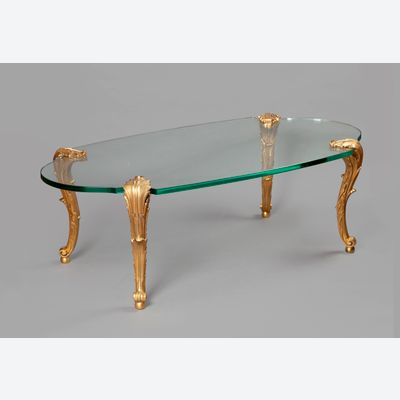 A gilt bronze and glass coffee table – Signed P.E. Guerin New York