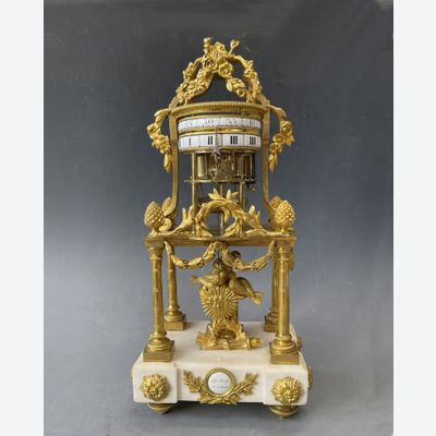 A Louis XVI fire-gilt