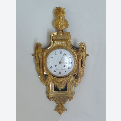 very fine Lou A very fine gilt bronze cartel clock, d’époque Louis XVI , mascaron, by Gérard à Ste Menehould, France  circa 1780.is XVI gilt bronze cartel clock, by Gérard à Ste Menehould, France  circa 1780.
