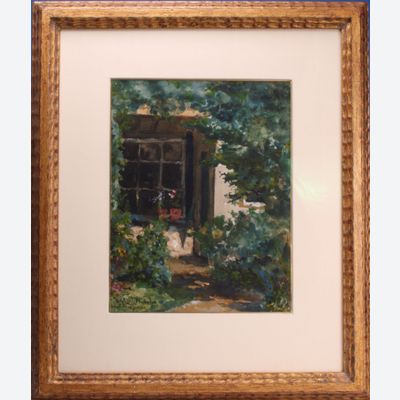 Gezicht op achterzijde huis met tuin.