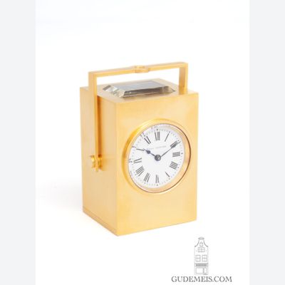 Een klein Frans verguld messing reisklokje, Paul Garnier.