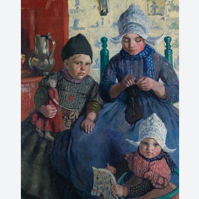 Drie kinderen in Volendamse klederdracht