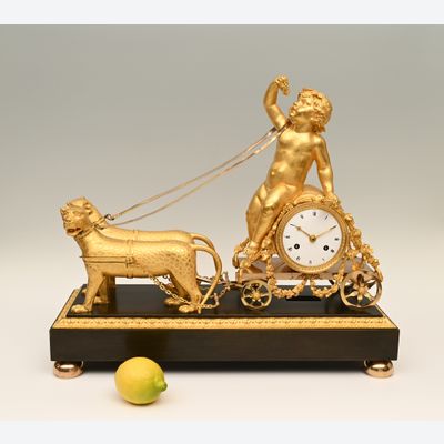 A very rare Empire mantle clock