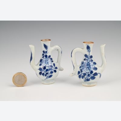 A pair of rare Chinese porcelain miniature jugs.