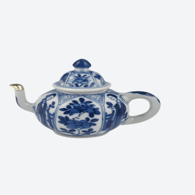 A miniature Chinese porcelain teapot.
