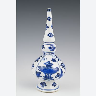 Een Chinese porseleinen sprenkelaar