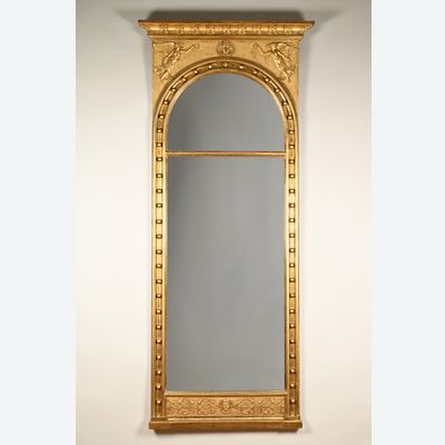 A  large Empire mirror.
