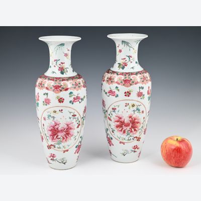 A pair of Chinese porcelain Famille Rose baluster Vases.