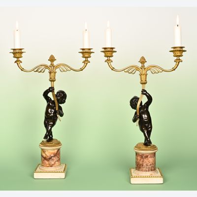 A Pair of English Candalabras with Bleu John.