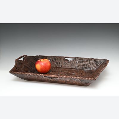 Een eikenhouten luiermand