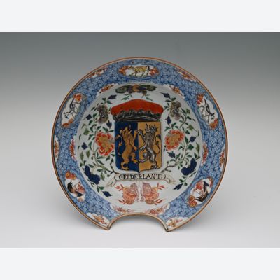 A Chinese porcelain shaving bowl