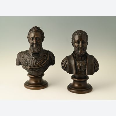 A pair of bronze busts