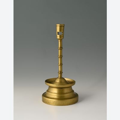 A Dutch bronze candlestick