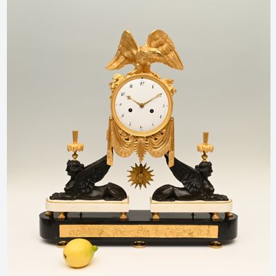An exceptional Louis Seize mantel clock.