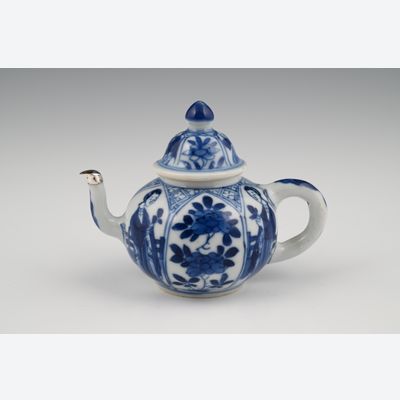 A miniature Chinese porcelain teapot.