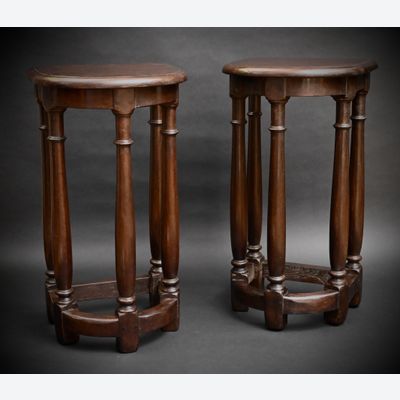 A pair of decorative oak stools