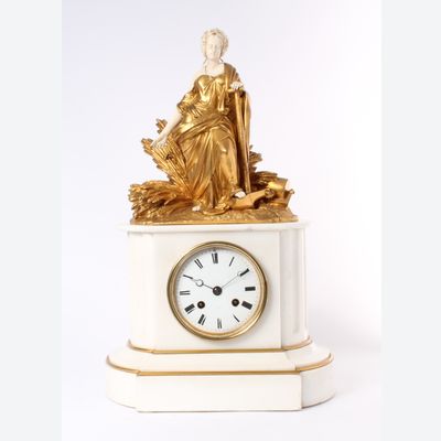 Een Franse Napoleon III marmer verguld brons en ivoren pendule, circa 1860