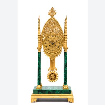 A russian neo-Gothic ormolu and malachite veneered mantel clock, circa 1830