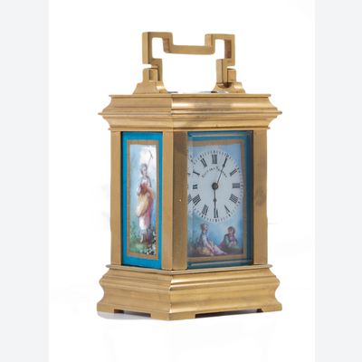 A charming small French 'Sevres' panelled ormolu carriage clock, circa 1900