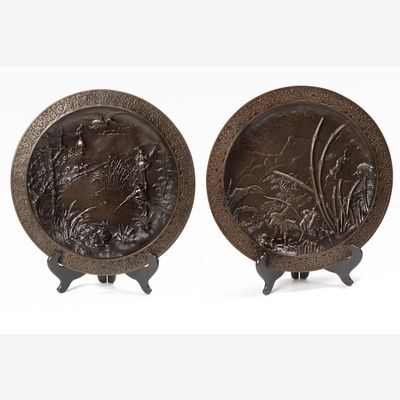 A lovely pair of far East bronze circular wall decoration circa 1880