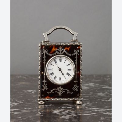 The small English tortoiseshell and silver carriage clock circa 1902