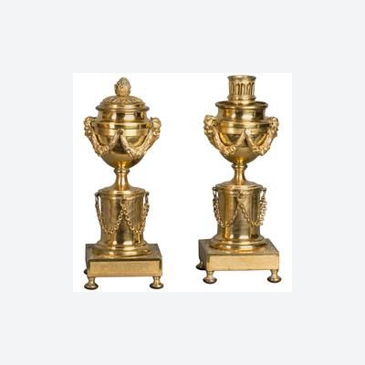 A pair of French Louis XVI ‘a double usage’ candlesticks, with rose mercury gilding