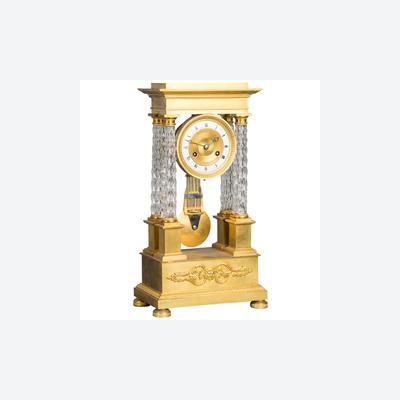 An attractive Charles X ormolu and crystal portico striking 8-day mantel clock