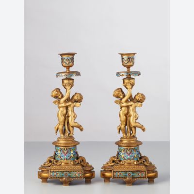 A pair of French ormolu Champleve candlesticks, circa 1880