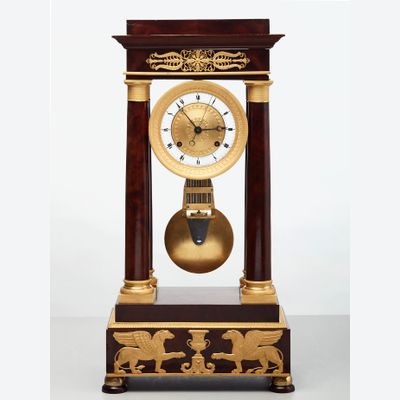 A French mahogany regulator ‘portico’ mantel clock by Montassier, circa 1820