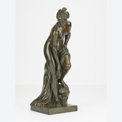 Elegant naked bronze statue