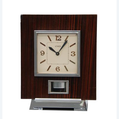 M146 Atmos clock, Palisander wood, J.L. Reutter nr. 4424, France circa 1930.