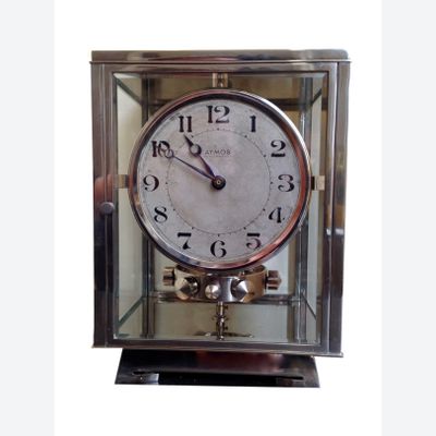 M211 Nikkelen art deco JL Reutter vier glazen Atmos klok