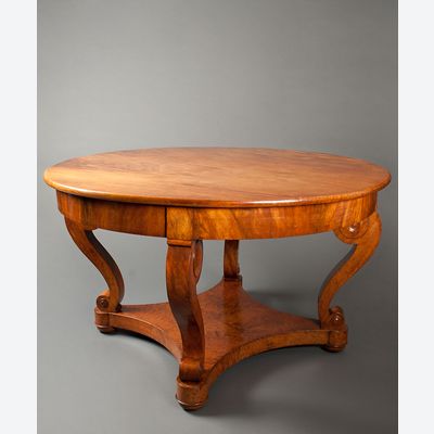 Een Uitzonderlijke Gueridontafel in Padouk en Amboyna