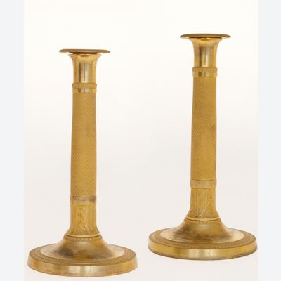 Een Paar Vuurvergulde Empire Kandelaars in Vuurverguld Brons