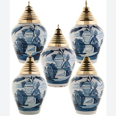 A Set of Five Blue and White Dutch Delft 'VOC' Tobacco Jars