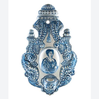A Blue and White Dutch Delft Earthenware Sconce Decorated with a Figure - Lady