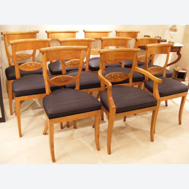 Large set of 12 Dutch Empire elmwood diningchairs.