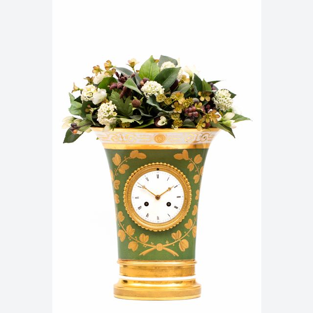 A lovely French Empire porcelain urn mantel clock, circa 1800