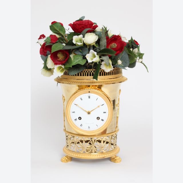 A fine French Empire ormolu urn mantel clock, Angevin A Paris, circa 1800