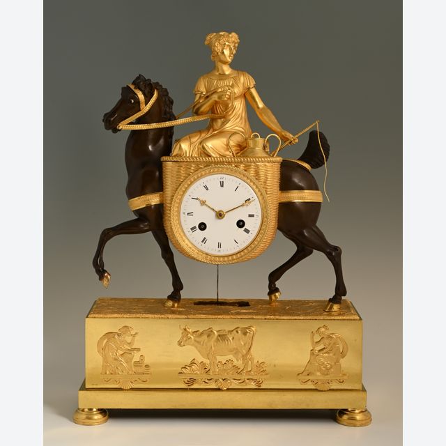 Empire pendule 'laitière à cheval'
