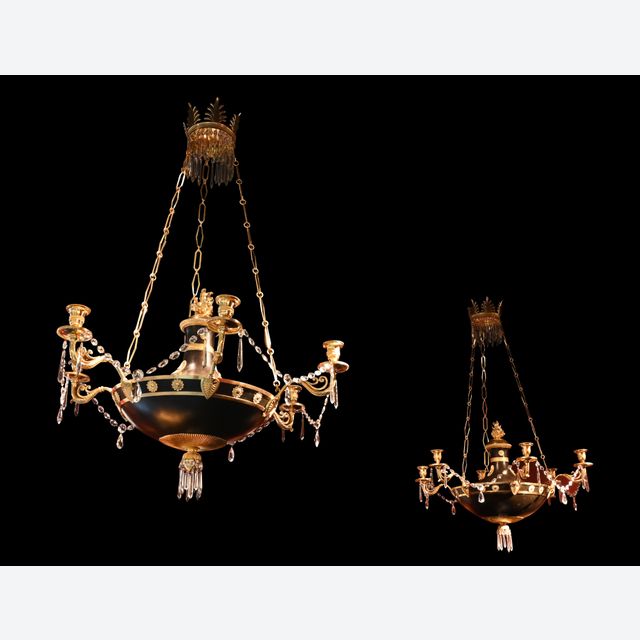 A rare near pair of Russian Empire discus chandeliers