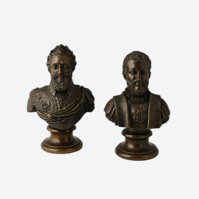 A pair of bronze busts