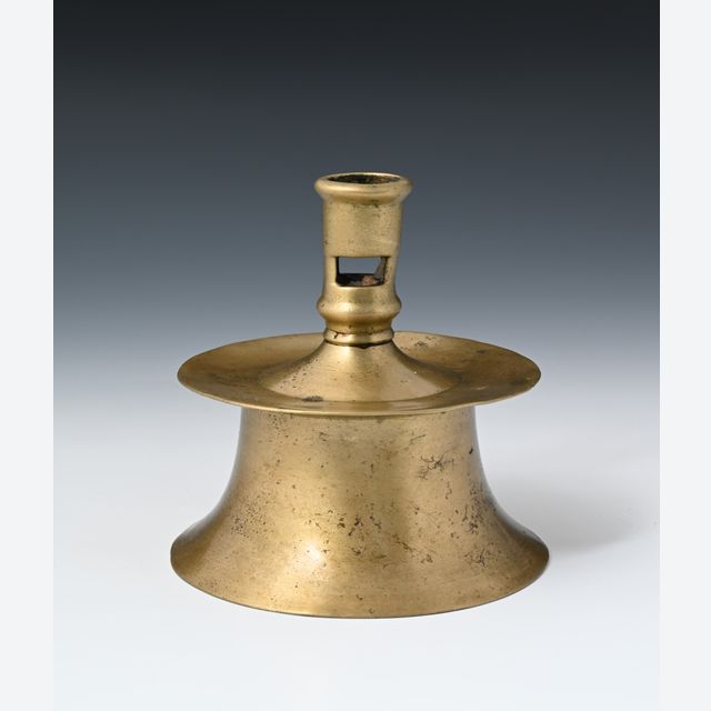 A bronze candlestick