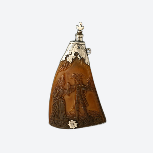 A 17th-century Dutch powder horn featuring an erotic scene.