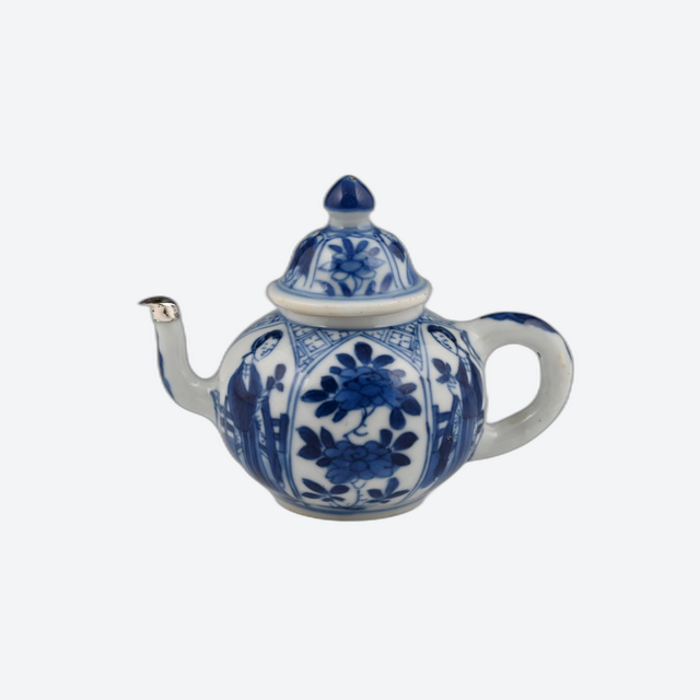 A miniature Chinese porcelain teapot.