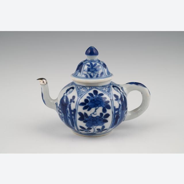 A miniature Chinese porcelain teapot.