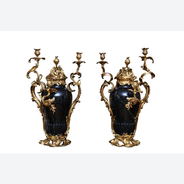 An impressive pair of candelabra, signed ‘Escalier de Cristal Paris’
