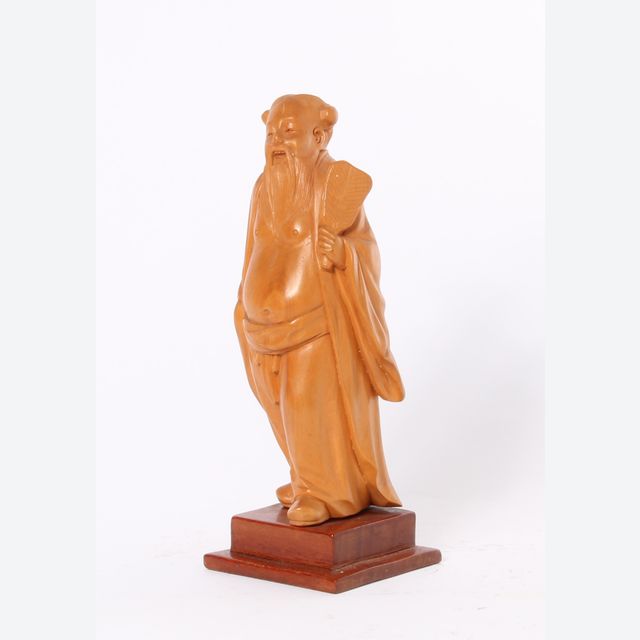 A lovely Chinese carved boxwood sculpture of a man, circa 1920.