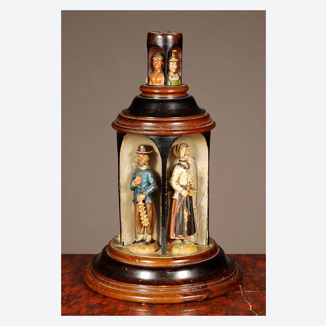 A very rare southern German/Austrian carved revolving figure box with merchants, ca 1850.